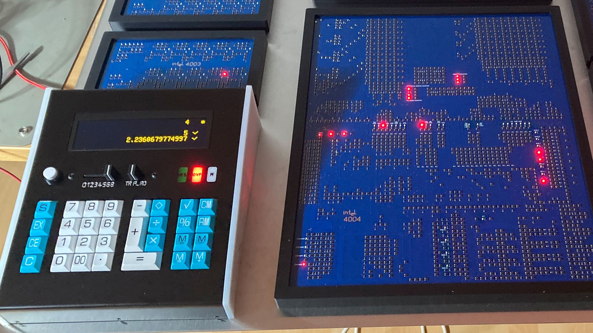 Supersized chip family gathers for the 54th anniversary of the Intel 4004 CPU — 4001 ROM, 4002 RAM, and 4003 shift registers feature in a reconstructed Busicom 