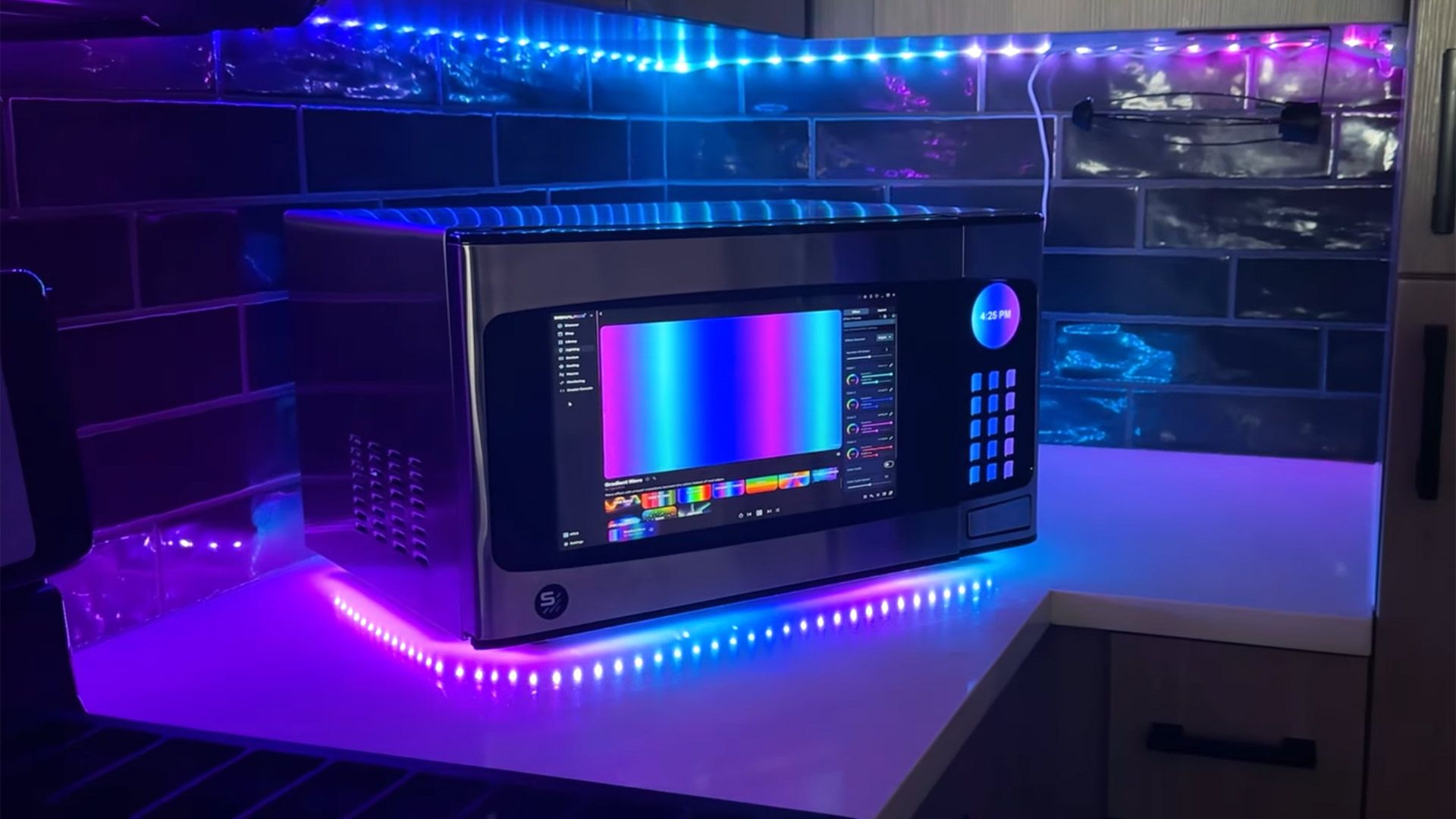 Microwave repurposed into slick custom All-in-One PC — door serves as display, motherboard rotates on the turntable, and Stream Deck used for keypad