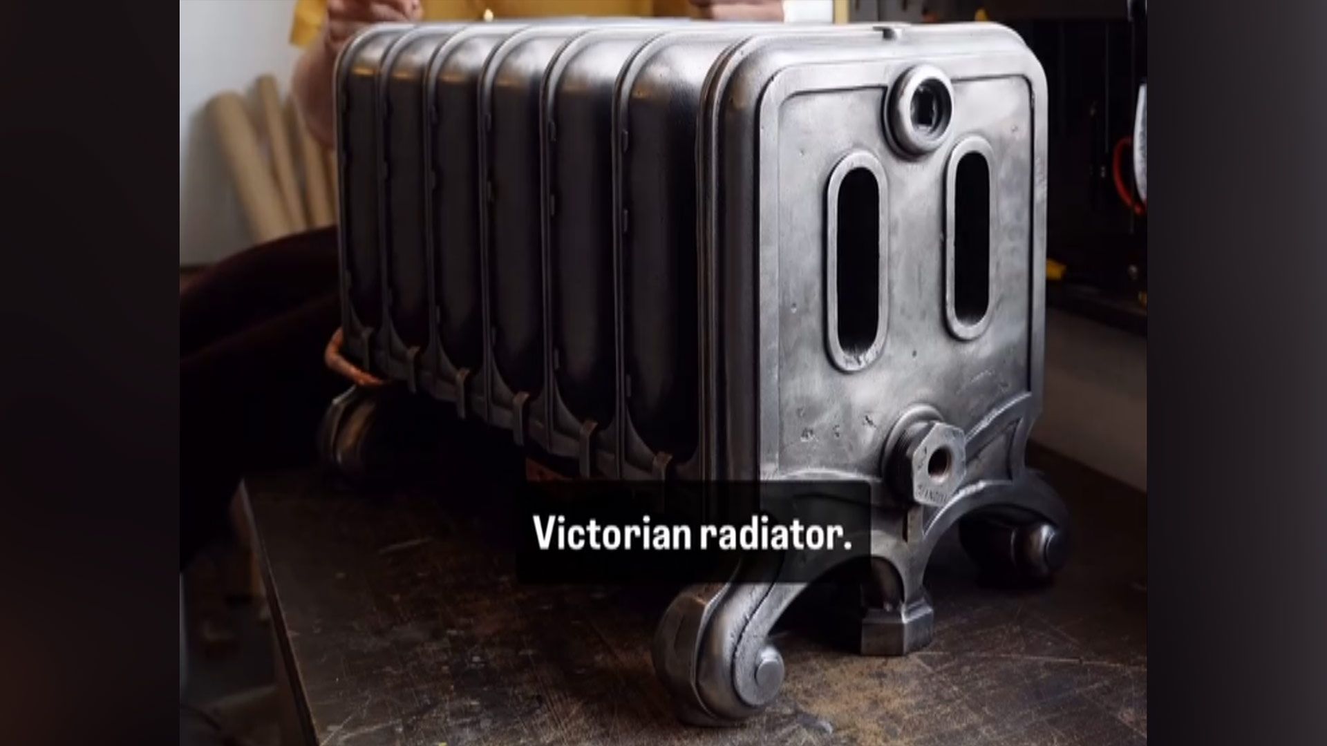 110-pound cast-iron Victorian radiator modded into a gaming PC — massive radiator used for cooling the bottom-mounted PC components