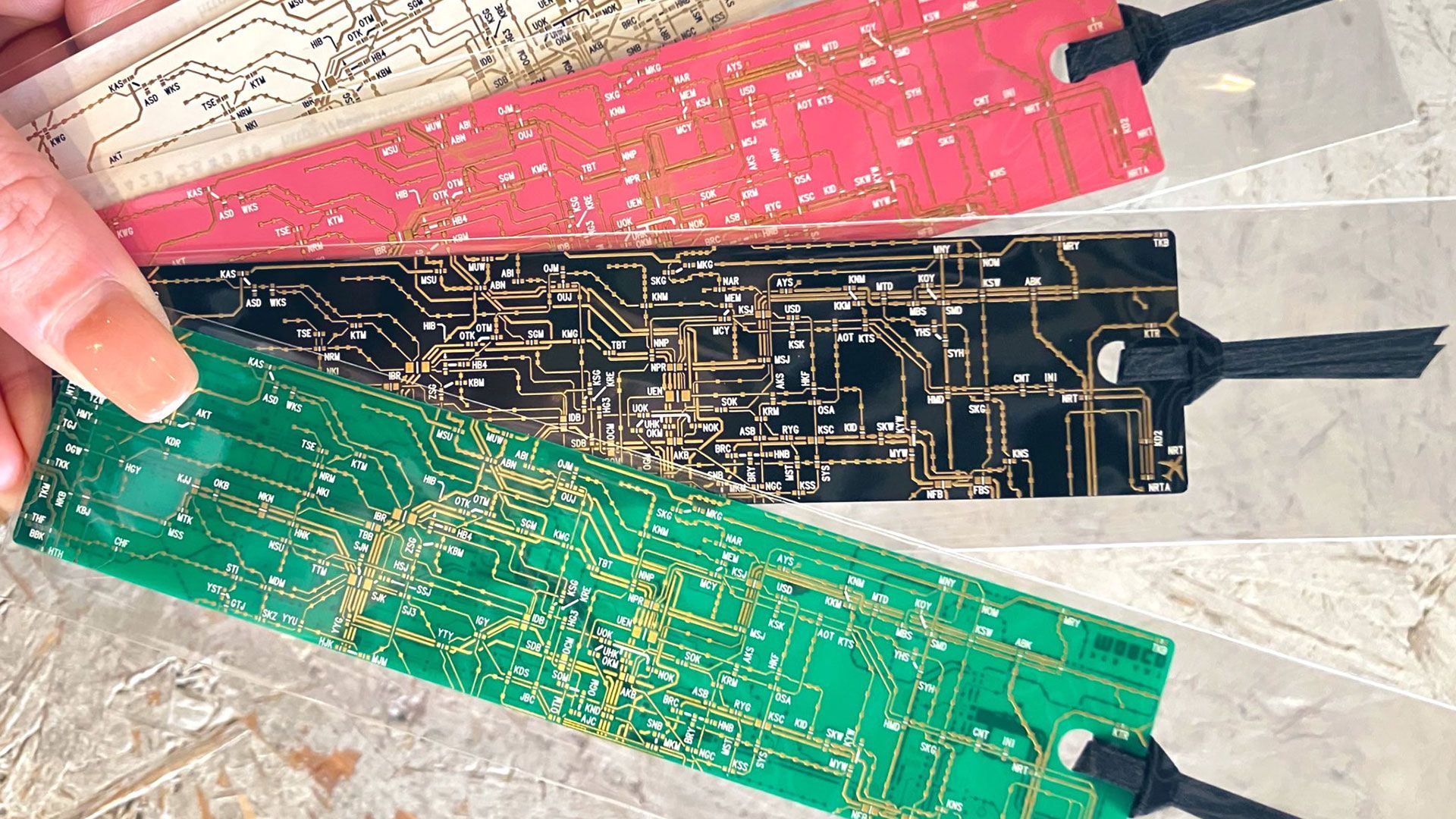 Japanese art museum intros $15 bookmarks made from PCBs — the PCB traces form a miniature Tokyo Metro map