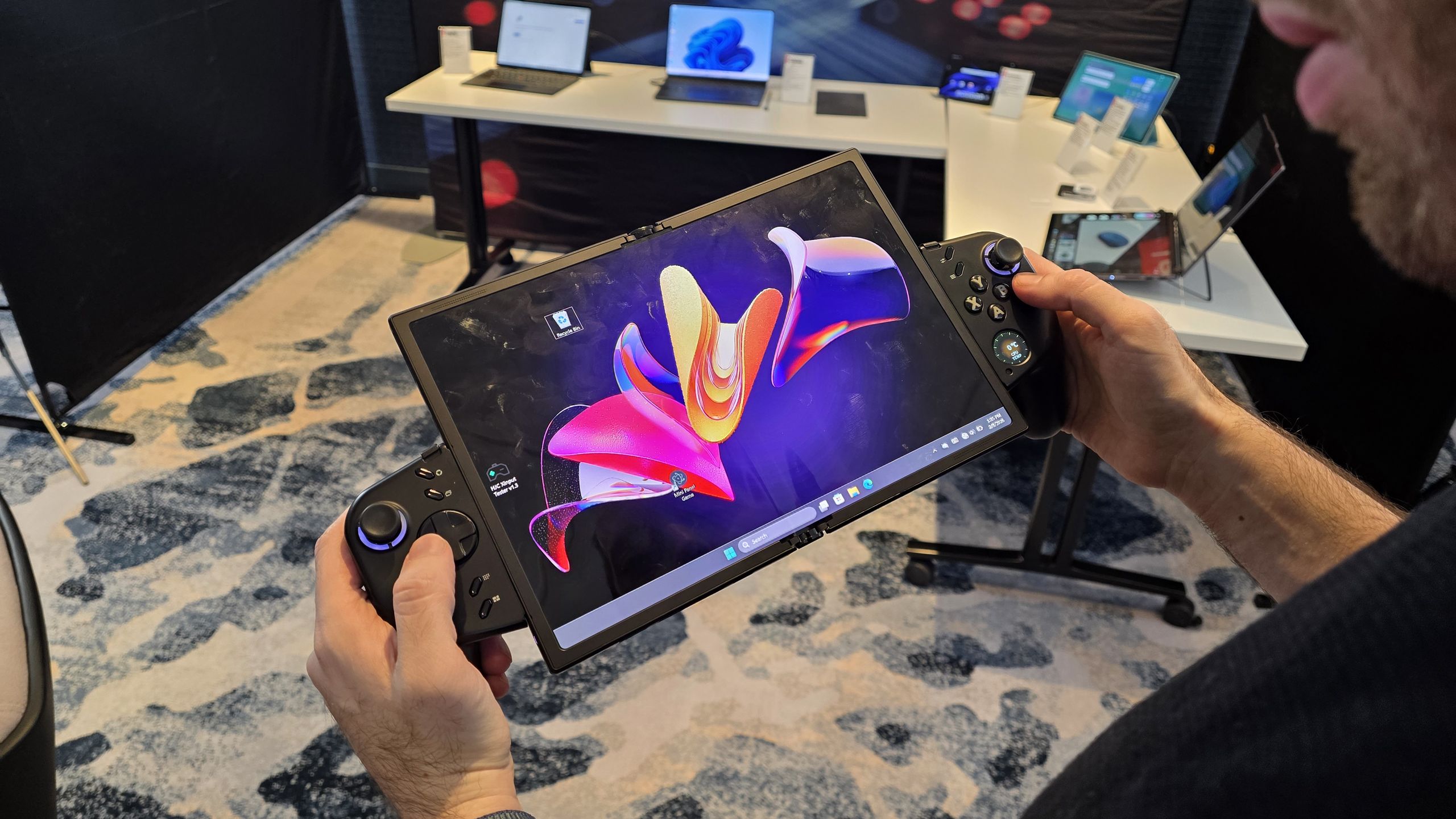 Lenovo's Legion Go Fold-able gaming handheld concept has four screen modes, also works as a small laptop — POLED display unfolds from 7.7 to 11.6 inches