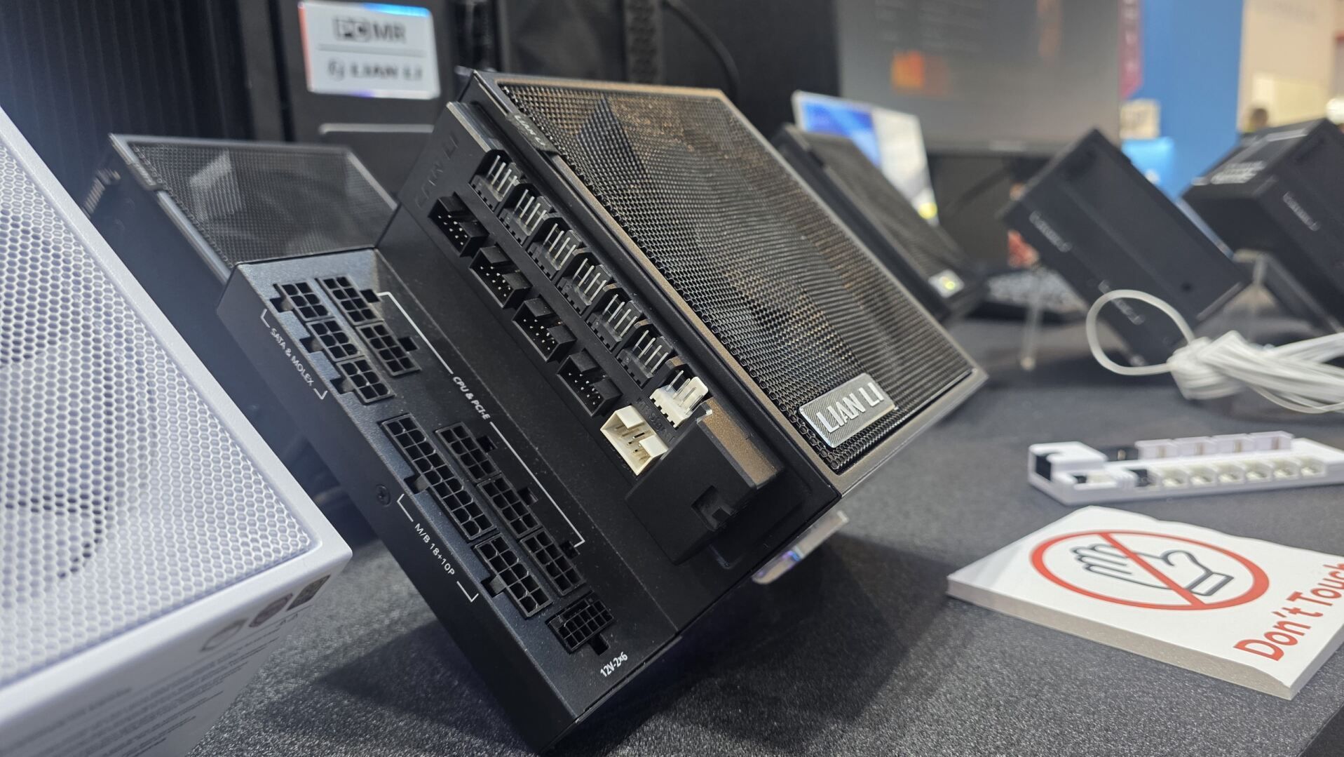 Lian Li's Edge Platinum V2 PSUs have an LED dust indicator, magnetic filter, and a snap-on fan and USB header hub — Edge line's trademark 90-degree power connec