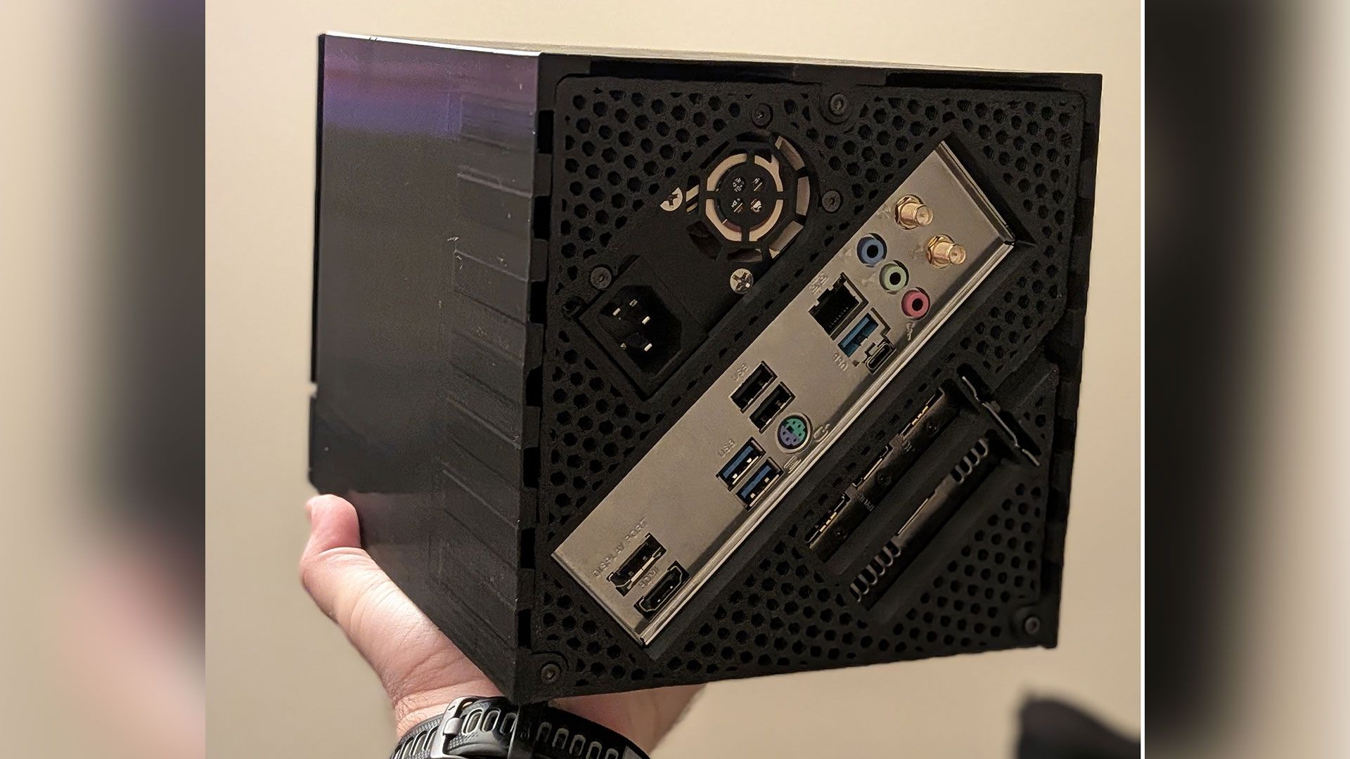 AMD engineer 3D-prints Steam Machine-a-like with diagonal mobo mounting — parts include a Mini ITX motherboard, RTX 5060, and a flex ATX PSU